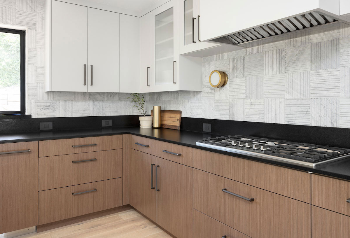 A redesigned modern bungalow kitchen with clean lines and subdued colors.